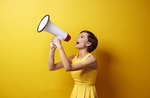 lady in yellow shouting